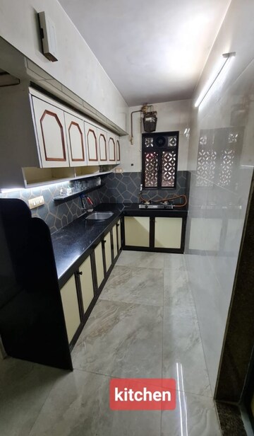 Kitchen in 2 BHK Apartment at Rose Apartments Marol, Marol – for Rent