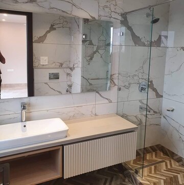 Bathroom in 4 BHK Builder Floor at DLF Atria, Dlf Phase ii – for Sale