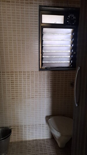 Bathroom in 3 BHK Apartment at Eden Woods complex, Manpada – for Rent