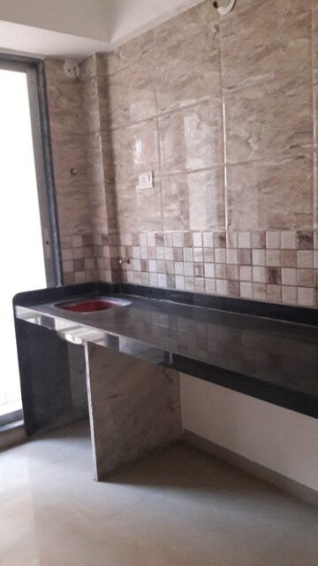 Kitchen in 1 BHK Apartment at Shining Marble Arch, Taloja – for Sale