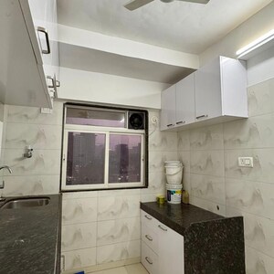 Kitchen in 2 BHK Apartment at Accord CHS Andheri West, Lokhandwala Complex – for Rent