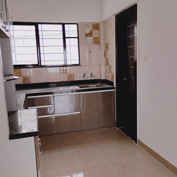 Kitchen in 2 BHK Apartment at Ratan Neptune, Hadapsar – for Rent