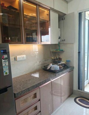 Kitchen in 2 BHK Apartment at Piramal Vaikunth, Balkum Pada – for Rent