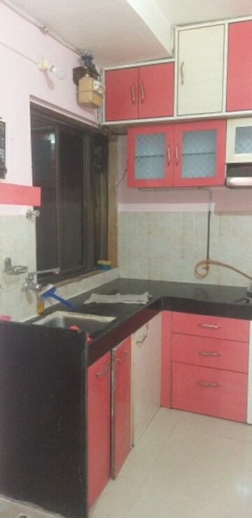 Kitchen in 2 BHK Apartment at Runwal Garden City, Balkum Pada – for Rent