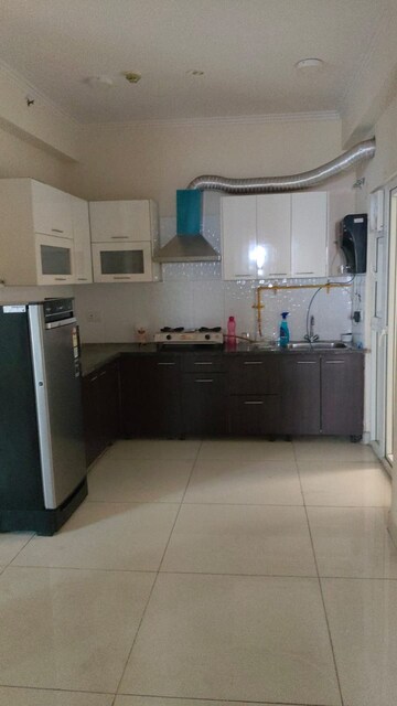 Kitchen in 2 BHK Apartment at ABA Cherry County, Tech Zone 4 Greater Noida – for Rent