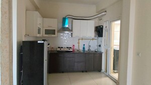 Kitchen in 2 BHK Apartment at ABA Cherry County, Tech Zone 4 Greater Noida – for Rent