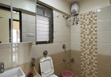 Bathroom in 2 BHK Apartment at Sethia Kalpavruksh Heights, Kandivali West – for Sale