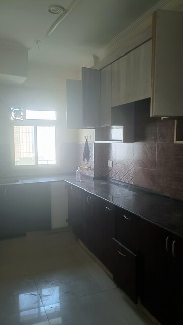 Kitchen in 2 BHK Apartment at Aims Golf City, Sector 75 – for Rent