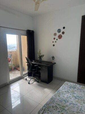 Living Room in 2 BHK Apartment at Supertech The Romano, Sector 118 – for Rent