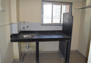 Kitchen in 1 BHK Apartment at Nakshatra Heights, Kandivali West – for Sale