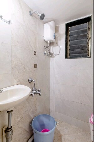 Bathroom in 1 RK Apartment at Khar West – for Rent