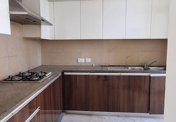 Kitchen in 3 BHK Apartment at HCBS Auroville, Sector 103 – for Sale