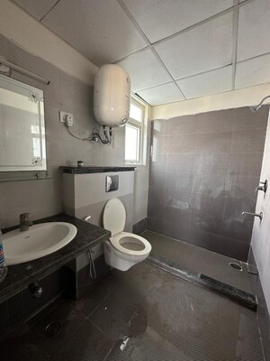Bathroom in 3 BHK Apartment at NK Savitry Enclave, Vip Road – for Rent