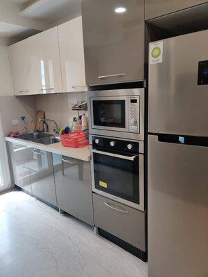 Kitchen in 3 BHK Apartment at Unitech Uniworld City, Sector 30 – for Sale