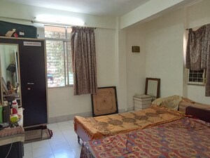 Bedroom in 4 BHK Apartment at Ajinkya Apartment, Santacruz West – for Sale