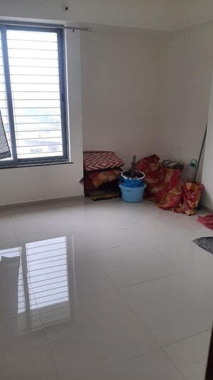 Room in 2 BHK Apartment at Saarrthi Skybay, Mahalunge – for Rent