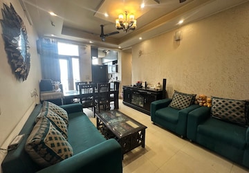 Living Room in 2 BHK Apartment at Galaxy North Avenue, Gaur City 1 – for Sale