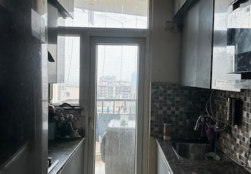 Kitchen in 2 BHK Apartment at Galaxy North Avenue, Gaur City 1 – for Sale