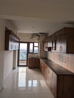 Kitchen in 4 BHK Apartment at Azeagaia Botanica, Vrindavan Yojna – for Rent
