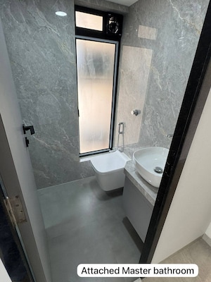 Bathroom in 1 BHK Apartment at Juhu Gulmohar CHS, Vile Parle West – for Rent