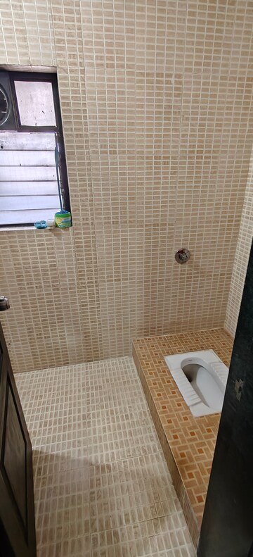 Bathroom in 3 BHK Apartment at Vikram Nandadeep, Senapati Bapat Road – for Rent