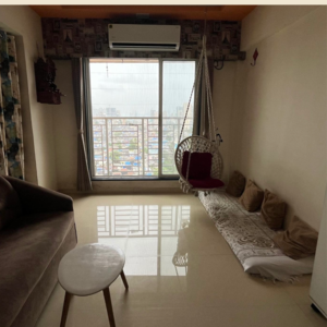Living Room in 1 BHK Apartment at Shraddha Evoque, Bhandup West – for Sale