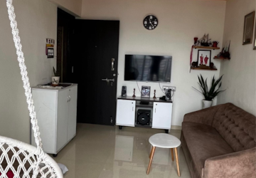 Living Room in 1 BHK Apartment at Shraddha Evoque, Bhandup West – for Sale