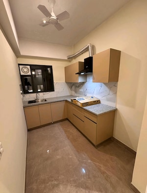 Kitchen in 2 BHK Apartment at Suncity Vatsal Valley, Gwal Pahari – for Rent