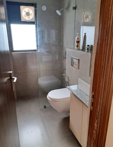 Bathroom in 3 BHK Apartment at Suncity Vatsal Valley, Gwal Pahari – for Rent