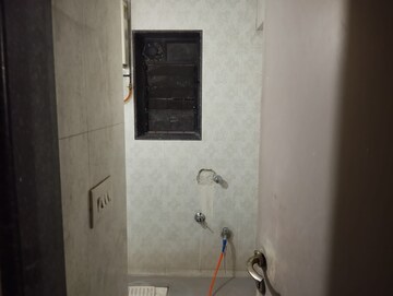 Bathroom in 2 BHK Apartment at Arjun CHS Vasant Vihar, Vasant Vihar – for Sale