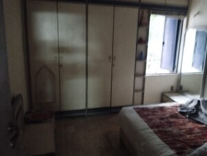 Bedroom in 2 BHK Apartment at Arjun CHS Vasant Vihar, Vasant Vihar – for Sale