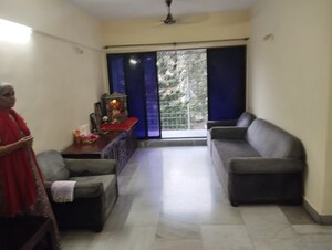 Living Room in 2 BHK Apartment at Arjun CHS Vasant Vihar, Vasant Vihar – for Sale
