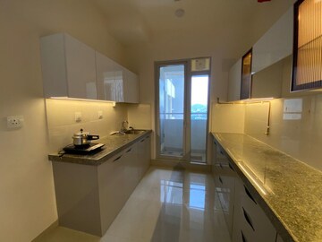 Kitchen in 2 BHK Apartment at Piramal Vaikunth, Balkum Pada – for Rent