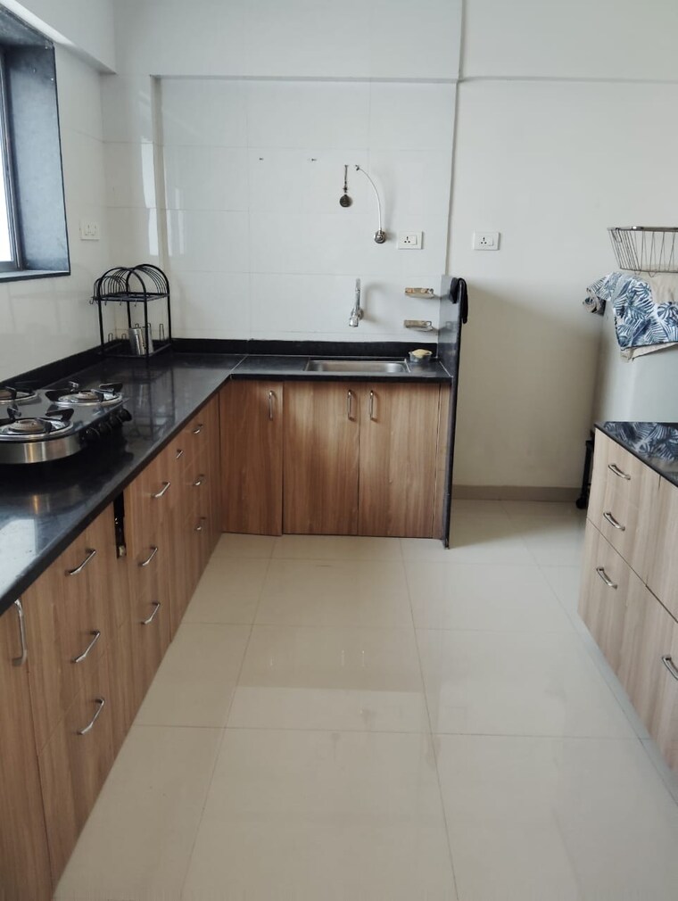 Kitchen, axis-paradigm-whistling-meadows 2 Bedroom 830 Sq.Ft. Apartment In Paud Road Pune 9331330
