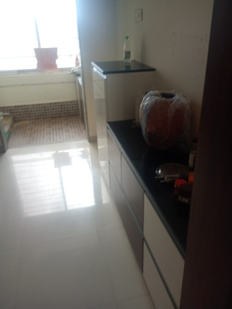 Kitchen, axis-paradigm-whistling-meadows 3 Bedroom 1300 Sq.Ft. Apartment In Paud Road Pune 9331357