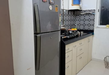 Kitchen in 1 BHK Apartment at Lodha Amara, Sandoz Baug – for Sale