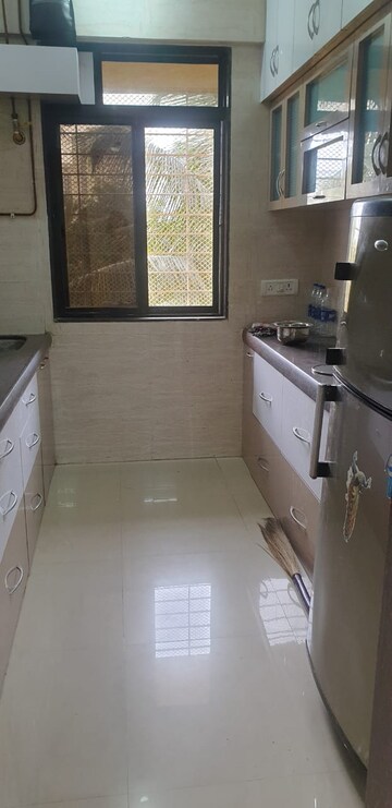 Kitchen in 2 BHK Apartment at VVA Jai Gopi Krishna CHS Ltd, Chembur – for Sale