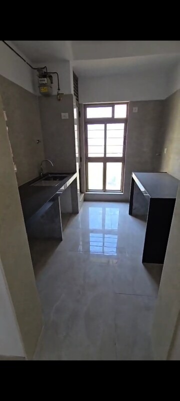 Kitchen in 2 BHK Apartment at Vasant Oasis Phase 2, Andheri East – for Sale