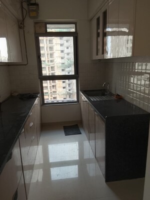 Kitchen in 4 BHK Apartment at Kalpataru Parkcity, Kolshet Road – for Rent