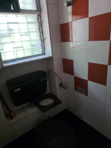 Kitchen in 2 BHK Apartment at Samkeet CHS, Vile Parle East – for Sale