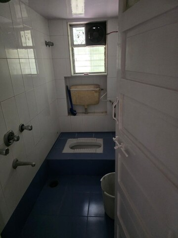 Bathroom in 2 BHK Apartment at Samkeet CHS, Vile Parle East – for Sale