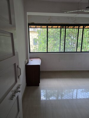 Room in 2 BHK Apartment at Samkeet CHS, Vile Parle East – for Sale