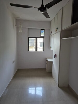 Room in 2 BHK Apartment at Samkeet CHS, Vile Parle East – for Sale