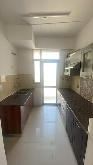 Kitchen in 2 BHK Apartment at Ajnara Homes, Sector 16b Greater Noida – for Sale