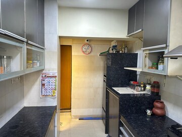 Kitchen in 4 BHK Apartment at Wadhwa TW Gardens, Kandivali East – for Rent