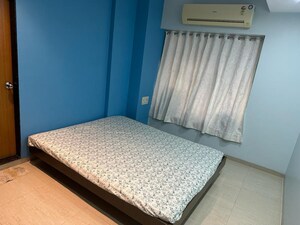 Bedroom in 1 BHK Apartment at Raheja Reflections, Kandivali East – for Sale