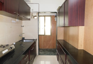 Kitchen in 2 BHK Apartment at Vasant Utsav Mumbai, Kandivali East – for Sale