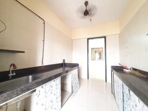 Kitchen in 4 BHK Apartment at Shapoorji Pallonji Siennaa, Kandivali East – for Sale
