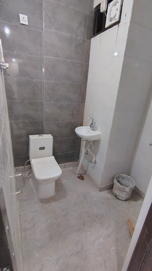 Bathroom in 2 BHK Builder Floor at Dwarka Mor – for Rent