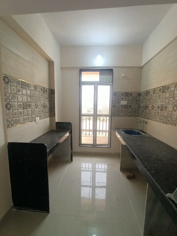 Kitchen in 2 BHK Apartment at Patel Ram Ambar, Ambernath East – for Rent